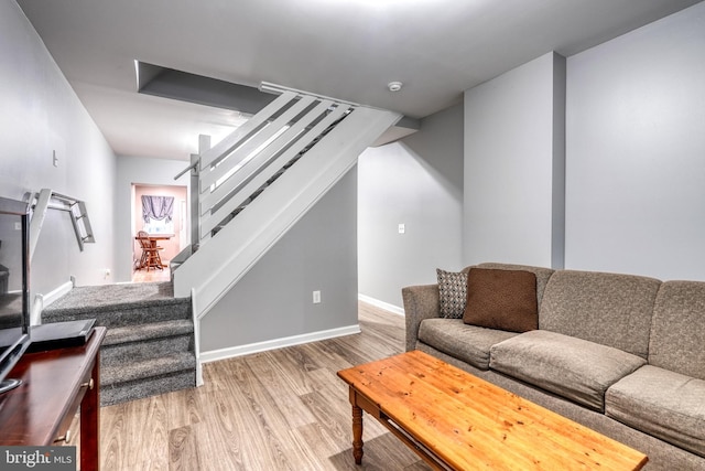 303 Lincoln Ave, Bristol, PA 19007 - living room featuring stairway and light wood-style flooring
