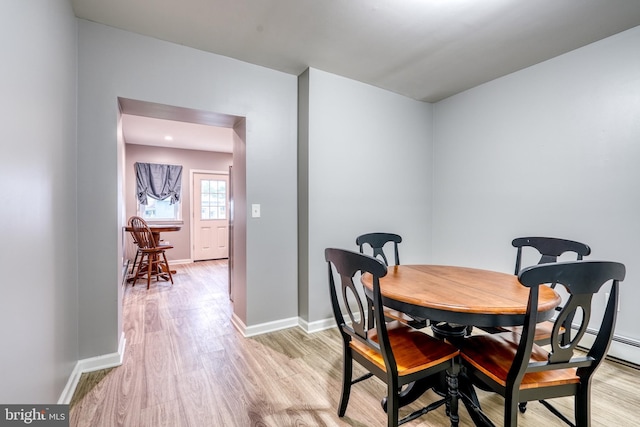 303 Lincoln Ave, Bristol, PA 19007 - dining area with light wood-type flooring and baseboards