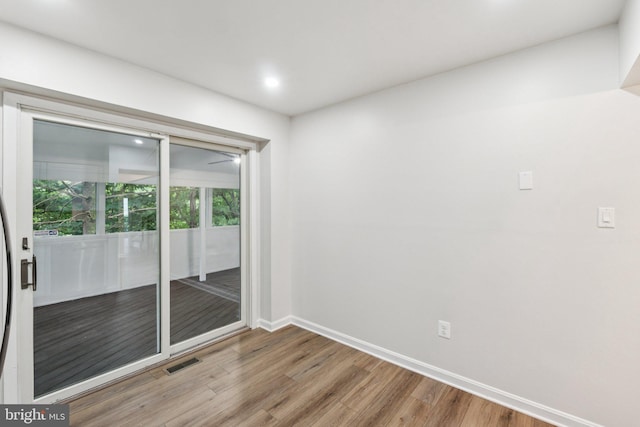 1544 Ingram Ter, Silver Spring, MD 20906 - spare room featuring wood finished floors and recessed lighting