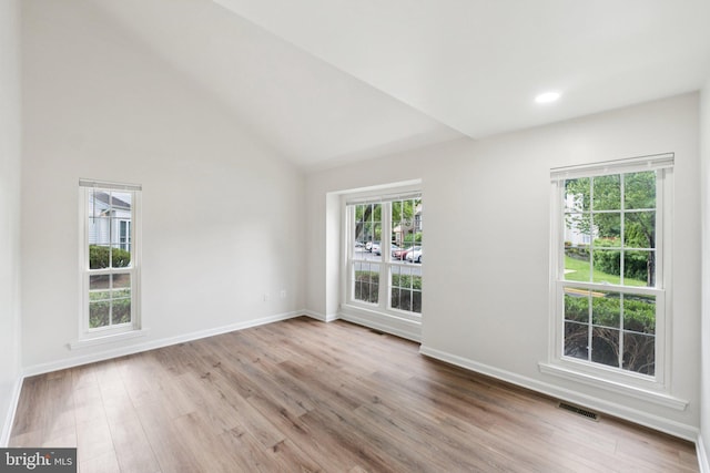 1544 Ingram Ter, Silver Spring, MD 20906 - spare room featuring wood finished floors, lofted ceiling, and recessed lighting