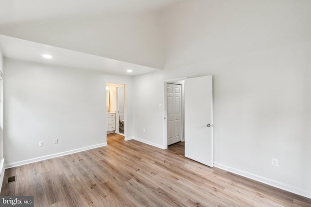 1544 Ingram Ter, Silver Spring, MD 20906 - unfurnished room featuring light wood-style floors, high vaulted ceiling, and recessed lighting