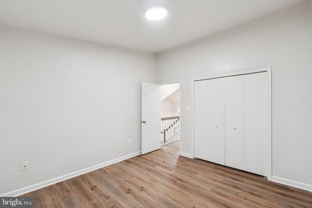 1544 Ingram Ter, Silver Spring, MD 20906 - unfurnished bedroom featuring wood finished floors and a closet