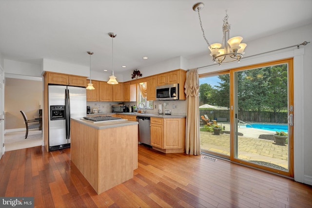 6 Spring Mill Ct, Sewell, NJ 08080 - kitchen featuring appliances with stainless steel finishes, light countertops, a chandelier, hardwood / wood-style floors, and recessed lighting