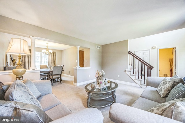 6 Spring Mill Ct, Sewell, NJ 08080 - living area with a chandelier, light colored carpet, stairs, and decorative columns