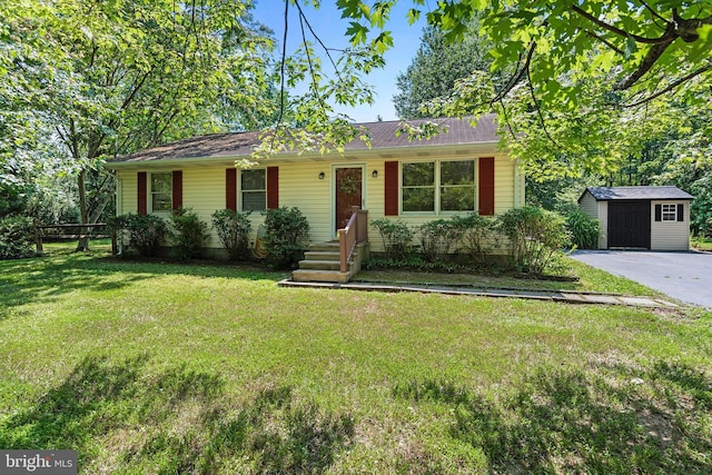 10624 Millbrook Dr, Chestertown, MD 21620 - single story home featuring an outdoor structure, a front yard, and driveway