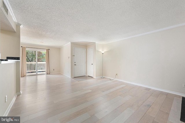 1517 Lincoln Way Unit 204, Mclean, VA 22102 - unfurnished living room featuring light wood-type flooring, a textured ceiling, and ornamental molding