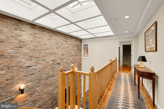 624 S Pitt St Unit 1/2, Alexandria, VA 22314 - hallway featuring brick wall, a skylight, recessed lighting, an upstairs landing, and coffered ceiling