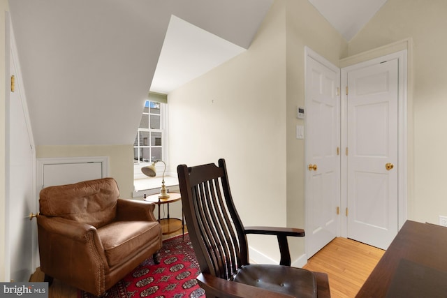 624 S Pitt St Unit 1/2, Alexandria, VA 22314 - living area featuring wood finished floors and vaulted ceiling