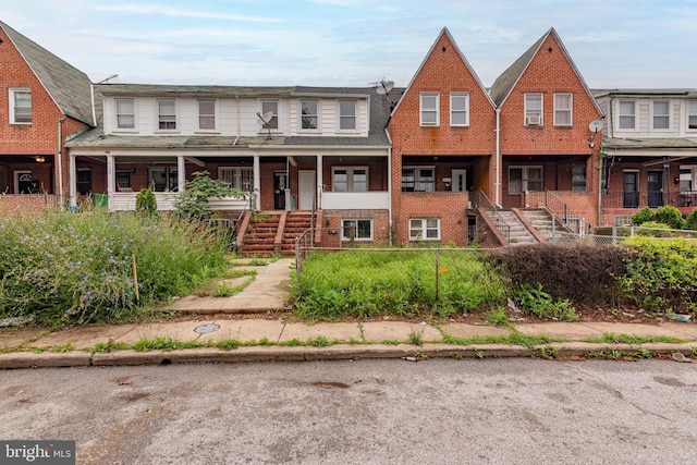 3116 Presstman St, Baltimore, MD 21216 - townhome / multi-family property with stairway and brick siding