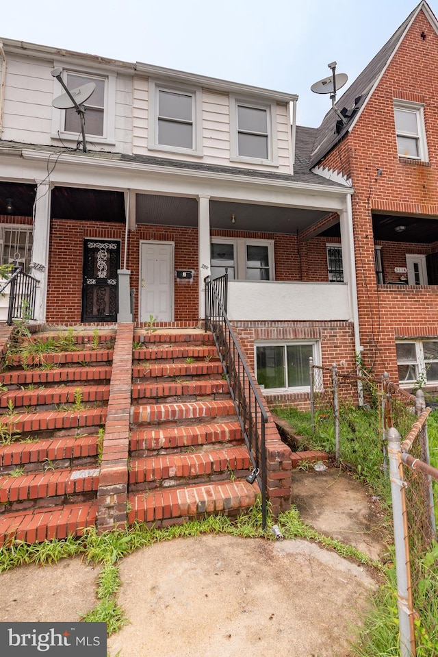 3116 Presstman St, Baltimore, MD 21216 - multi unit property with brick siding and covered porch