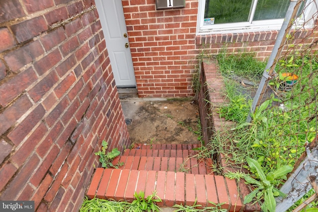 3116 Presstman St, Baltimore, MD 21216 - property entrance featuring brick siding