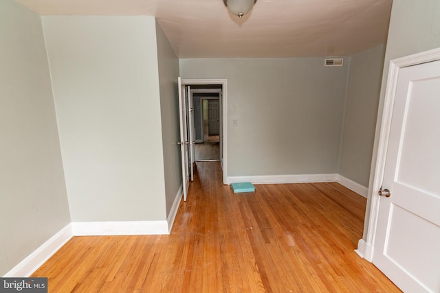 3116 Presstman St, Baltimore, MD 21216 - unfurnished room with light wood-type flooring and baseboards