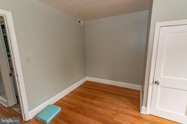 3116 Presstman St, Baltimore, MD 21216 - unfurnished room with baseboards and light wood-style flooring