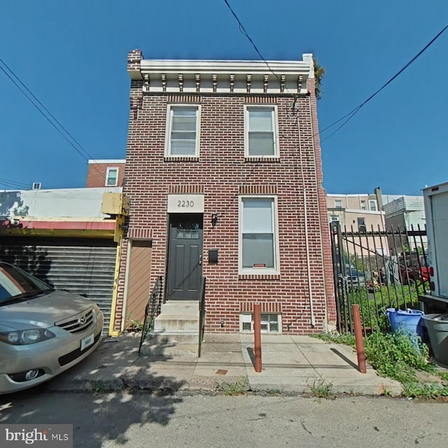 2230 N Mutter St, Philadelphia, PA 19133 - view of front of home with entry steps and brick siding