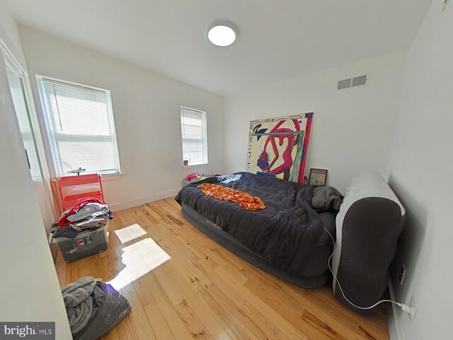2230 N Mutter St, Philadelphia, PA 19133 - bedroom featuring hardwood / wood-style flooring and baseboards