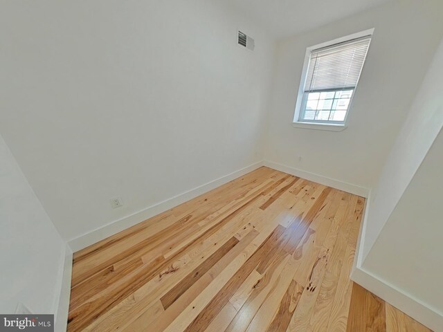 2230 N Mutter St, Philadelphia, PA 19133 - unfurnished room with wood finished floors and baseboards