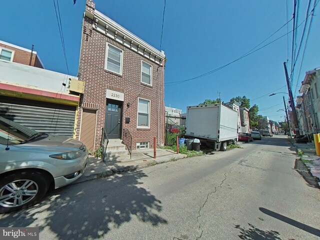 2230 N Mutter St, Philadelphia, PA 19133 - view of front of house with entry steps and brick siding