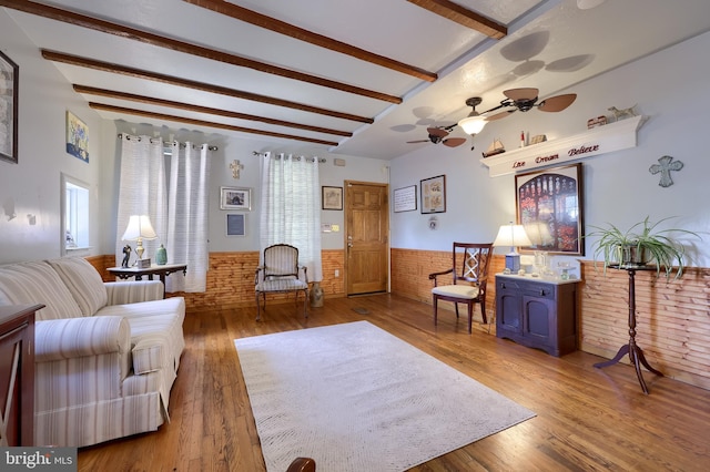 48 Ranck Ave, Lancaster, PA 17602 - living area featuring wainscoting, a ceiling fan, wood finished floors, and beam ceiling