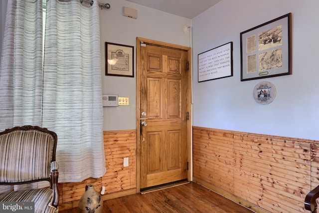 48 Ranck Ave, Lancaster, PA 17602 - entrance foyer featuring a wainscoted wall, dark wood-style floors, and wood walls