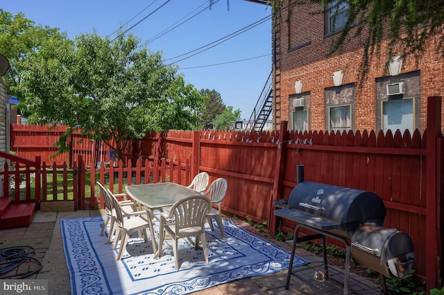 48 Ranck Ave, Lancaster, PA 17602 - fenced backyard with a grill, outdoor dining space, and a patio