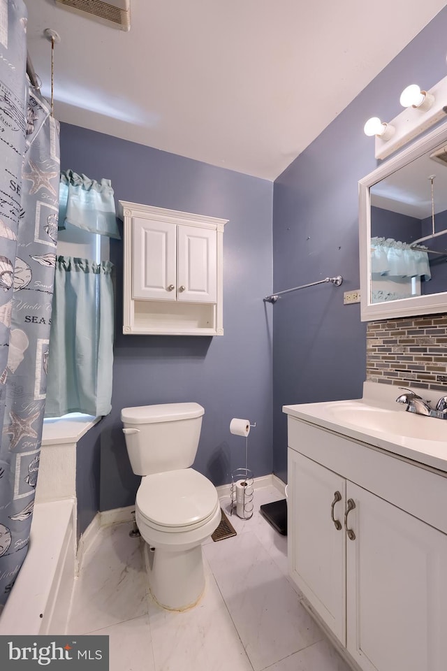 48 Ranck Ave, Lancaster, PA 17602 - full bathroom featuring vanity, tasteful backsplash, marble finish flooring, and shower / bath combo
