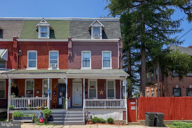 48 Ranck Ave, Lancaster, PA 17602 - townhome / multi-family property with covered porch and brick siding