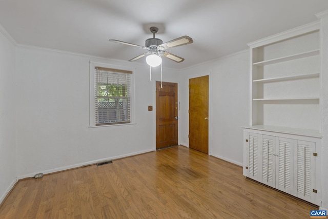 1562 Thomas Jefferson Pkwy, Charlottesville, VA 22901 - unfurnished room with ceiling fan, wood finished floors, and ornamental molding