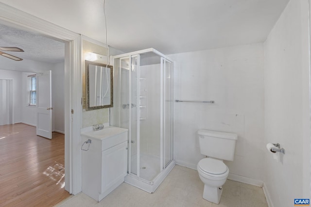 1562 Thomas Jefferson Pkwy, Charlottesville, VA 22901 - bathroom with vanity, a stall shower, and a ceiling fan