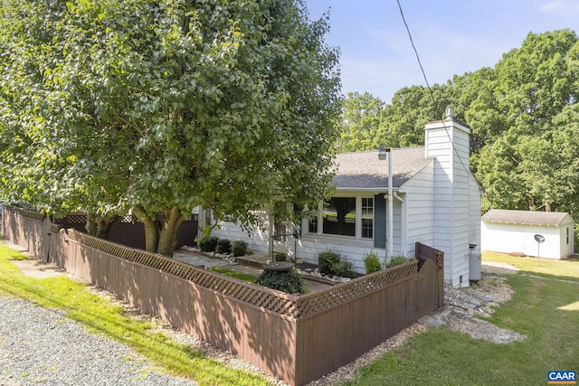 1562 Thomas Jefferson Pkwy, Charlottesville, VA 22901 - view of front facade with a chimney and roof with shingles