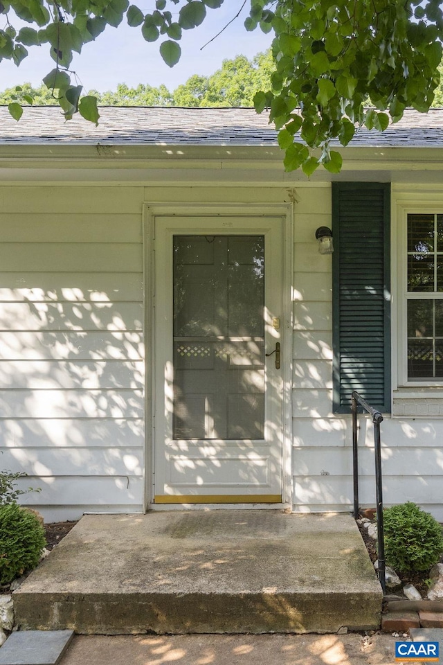1562 Thomas Jefferson Pkwy, Charlottesville, VA 22901 - doorway to property featuring a shingled roof