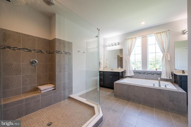 5745 Hawk Ridge Rd, Frederick, MD 21704 - full bath featuring a tile shower, tile patterned floors, a garden tub, and vanity