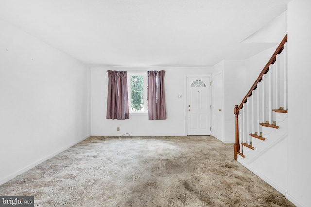 6344 Glenloch St, Philadelphia, PA 19135 - foyer featuring carpet and stairs