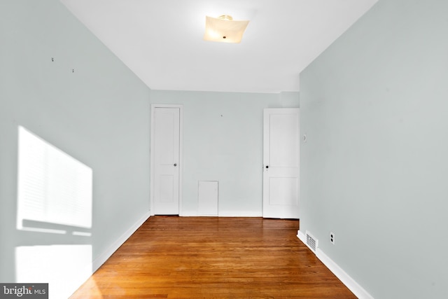 6344 Glenloch St, Philadelphia, PA 19135 - unfurnished room featuring wood finished floors and baseboards