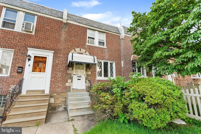 6344 Glenloch St, Philadelphia, PA 19135 - townhome / multi-family property with a high end roof, brick siding, and mansard roof