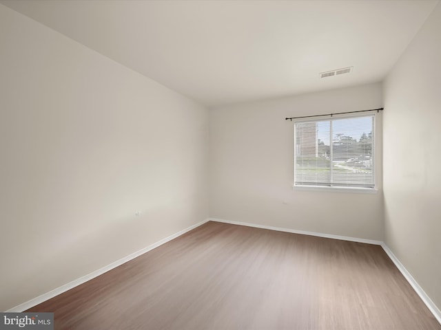 18615 Walkers Choice Rd # 2, Gaithersburg, MD 20886 - unfurnished room with wood finished floors and baseboards