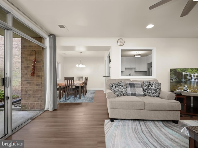 18615 Walkers Choice Rd # 2, Gaithersburg, MD 20886 - living room with wood finished floors, a ceiling fan, a chandelier, and recessed lighting