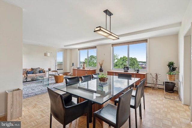 191 Presidential Blvd Unit R-605, Bala Cynwyd, PA 19004 - dining area featuring baseboard heating and baseboards