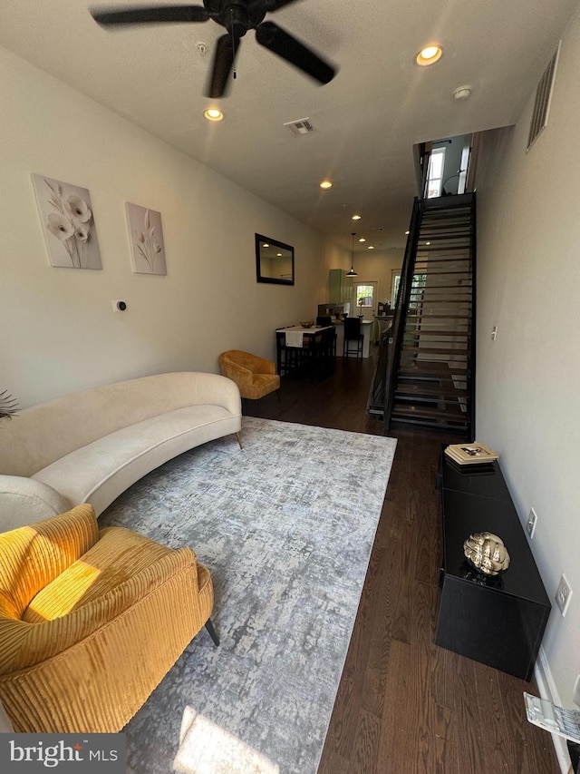 2208 Amber St, Philadelphia, PA 19125 - living area with dark wood-style flooring, ceiling fan, recessed lighting, and stairway