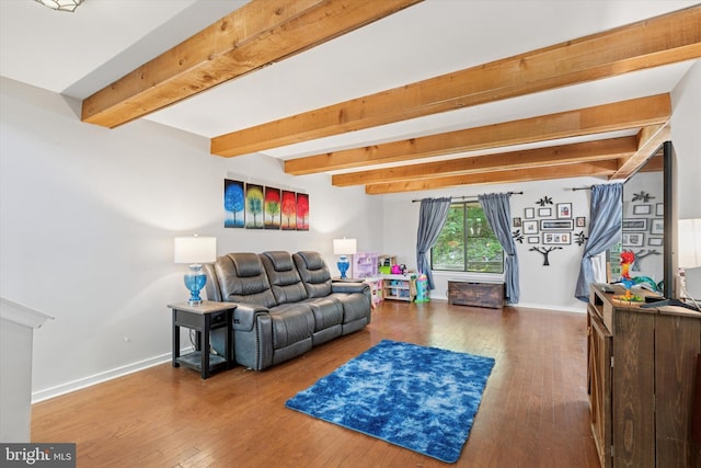 500 Lynetree Dr Unit 1-C, West Chester, PA 19380 - living room with beam ceiling and hardwood / wood-style flooring