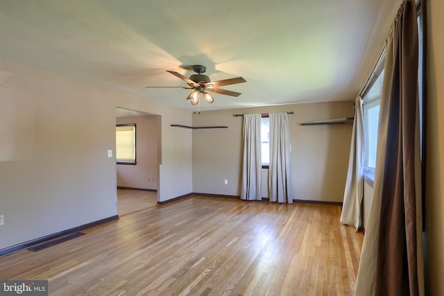 101 Walton Ave, Carlisle, PA 17013 - unfurnished bedroom featuring multiple windows, light wood-style floors, and ceiling fan