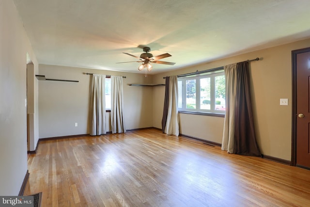 101 Walton Ave, Carlisle, PA 17013 - unfurnished bedroom with multiple windows, light wood-style flooring, and ceiling fan