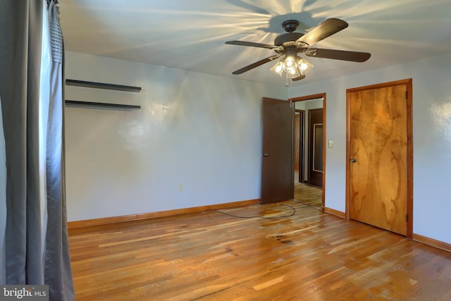101 Walton Ave, Carlisle, PA 17013 - unfurnished bedroom with wood finished floors, ceiling fan, and a closet