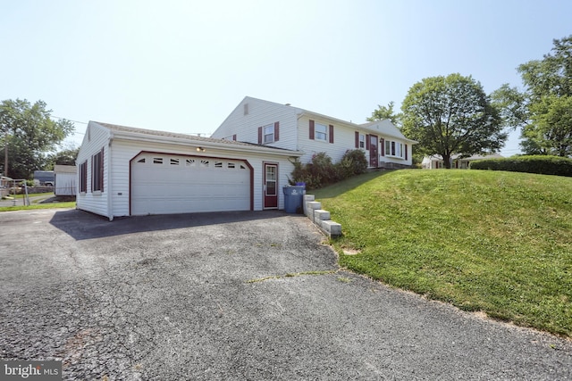101 Walton Ave, Carlisle, PA 17013 - ranch-style house featuring an attached garage, a front yard, and driveway