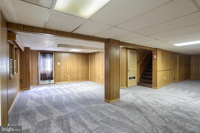 101 Walton Ave, Carlisle, PA 17013 - basement with carpet flooring, stairs, a drop ceiling, and wooden walls