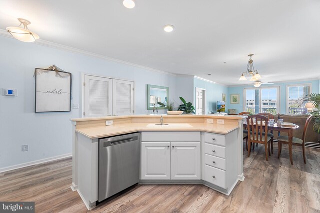 37 Fountain Dr W Unit 4C, Ocean City, MD 21842 - kitchen featuring dishwasher, white cabinetry, a chandelier, light wood-style floors, and light countertops