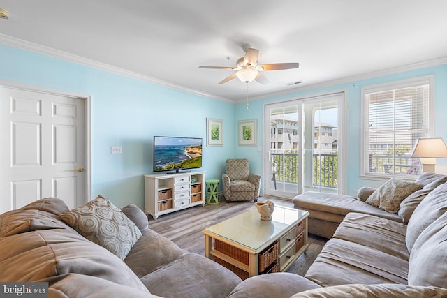 37 Fountain Dr W Unit 4C, Ocean City, MD 21842 - living room featuring crown molding, wood finished floors, and ceiling fan