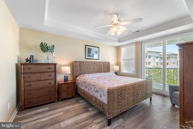 37 Fountain Dr W Unit 4C, Ocean City, MD 21842 - bedroom featuring a raised ceiling, access to exterior, wood finished floors, ornamental molding, and ceiling fan
