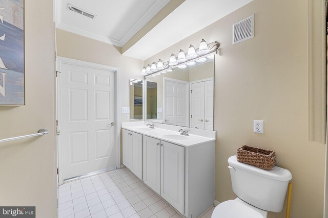 37 Fountain Dr W Unit 4C, Ocean City, MD 21842 - bathroom featuring tile patterned floors, ornamental molding, and double vanity