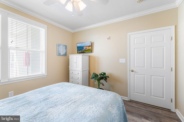 37 Fountain Dr W Unit 4C, Ocean City, MD 21842 - bedroom featuring dark wood-type flooring, ornamental molding, and ceiling fan
