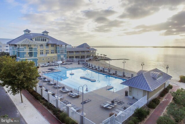 37 Fountain Dr W Unit 4C, Ocean City, MD 21842 - community pool featuring a patio and a water view